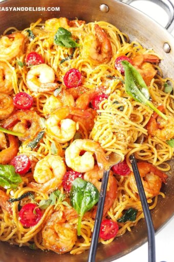 close up of garlic shrimp spaghetti in a pan