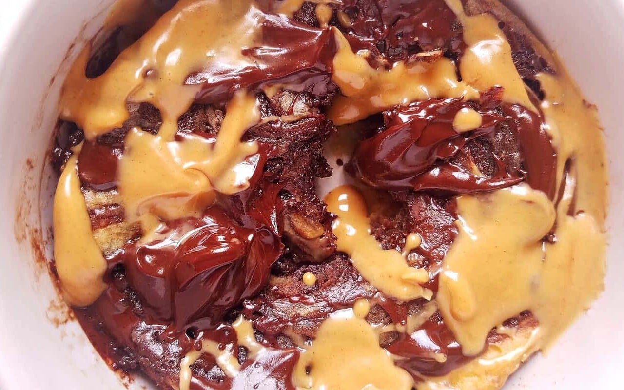 close up of peanut butter mug cake partially eaten