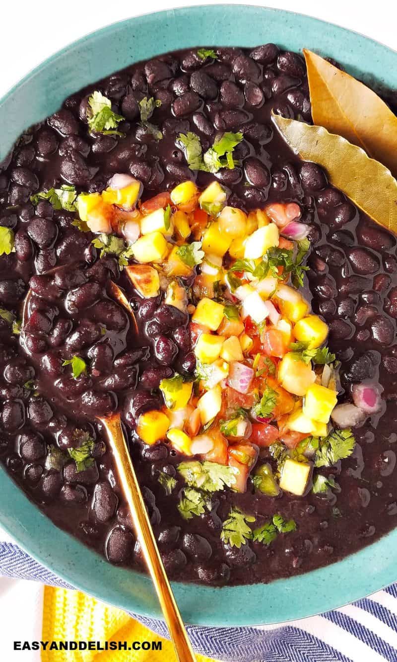 legumes in abowl with spoon on the side