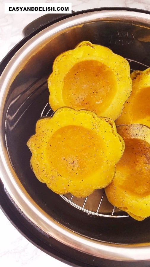 cooked acorn squash halves in an instant pot