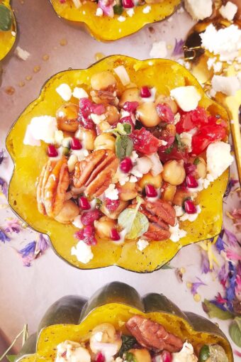 Instant Pot stuffed acorn squash halves on a tray