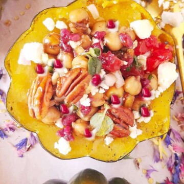 Instant Pot stuffed acorn squash halves on a tray