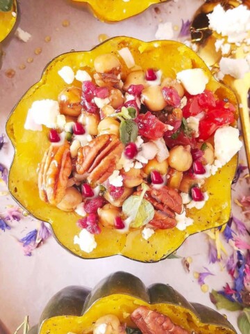 Instant Pot stuffed acorn squash halves on a tray