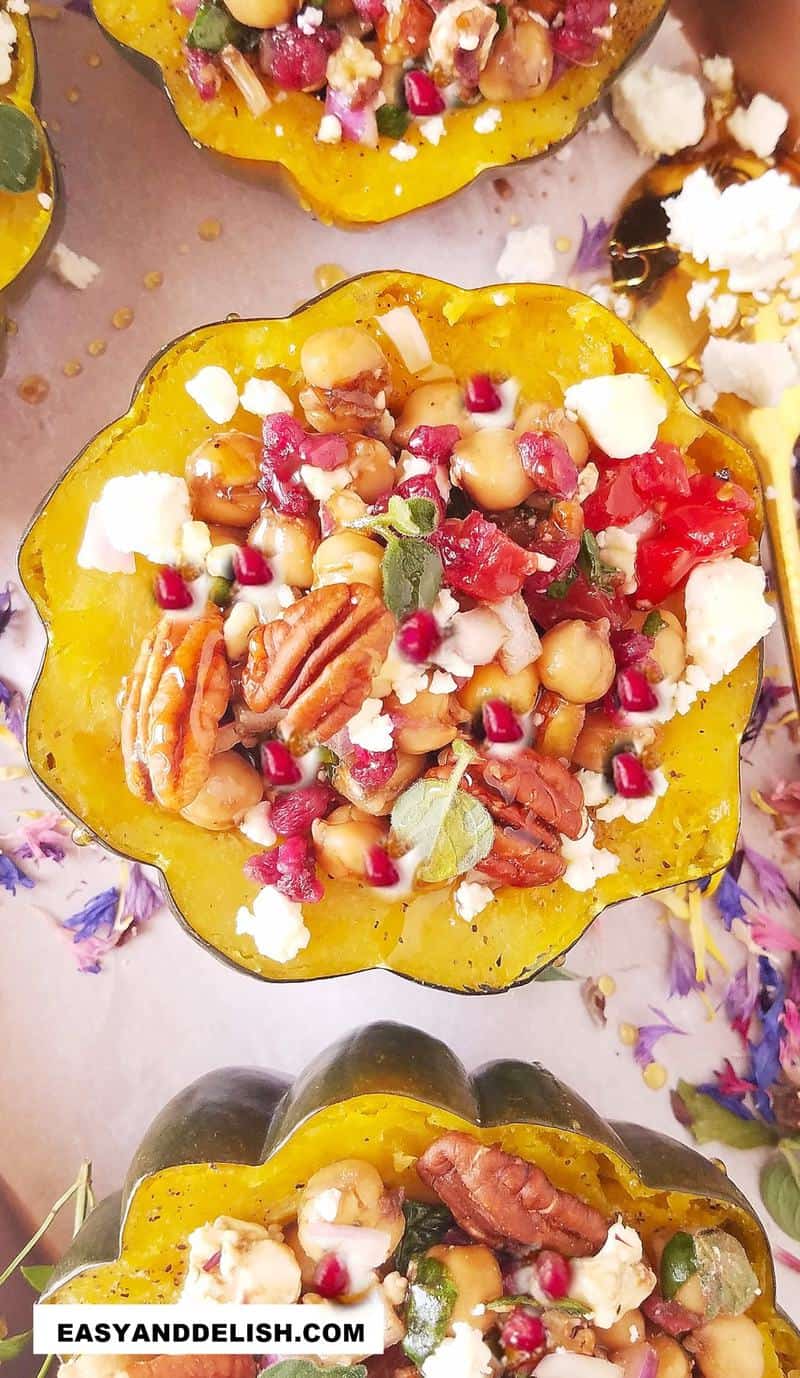 stuffed acorn squash halves on a tray