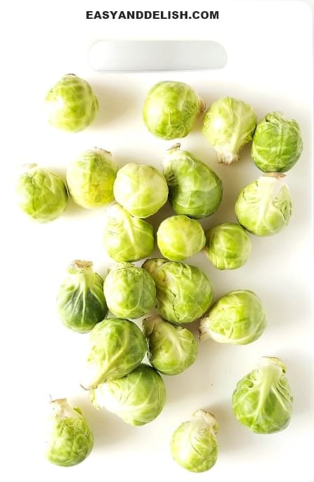 fresh brussels sprouts on a cutting board