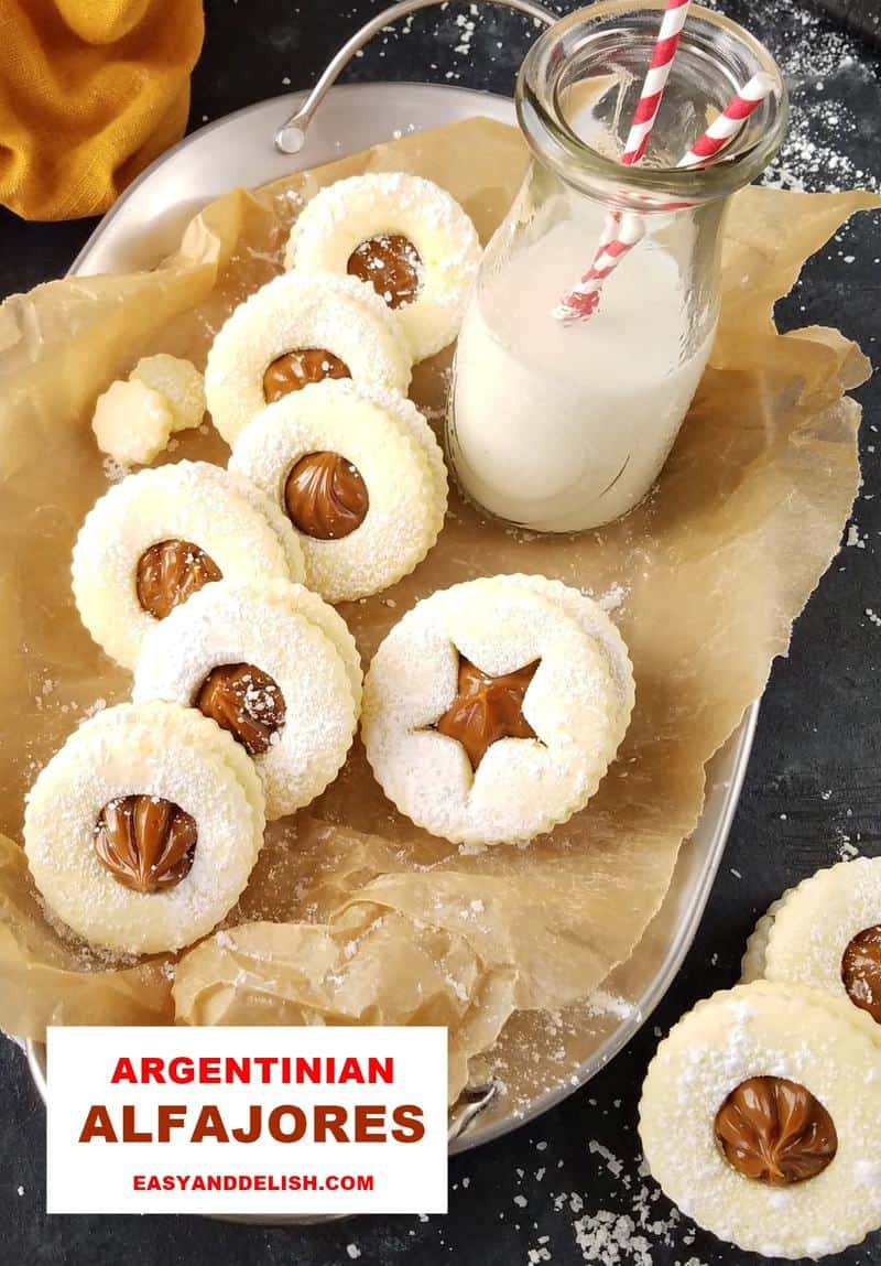 cookies in a platter with a bottle of milk