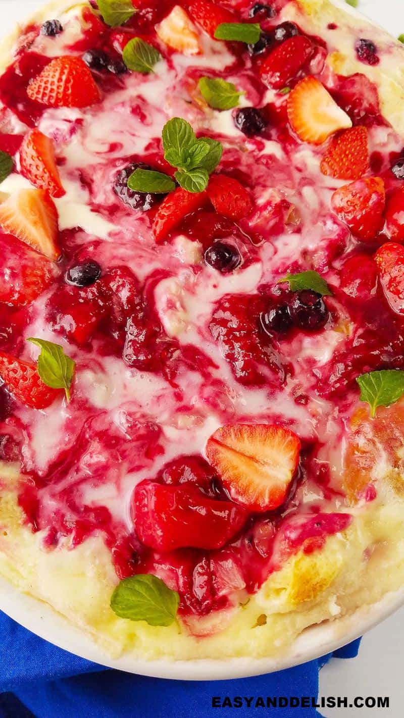 close up of French Toast Casserole with Brioche, cream cheese, and mixed berries