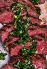 sliced marinated carne asada with chimichurri sauce