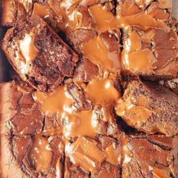 sliced fudgy brownies in a pan