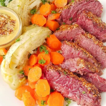 a platter of corned beef and cabbage