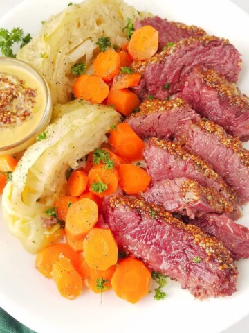 a platter of corned beef and cabbage