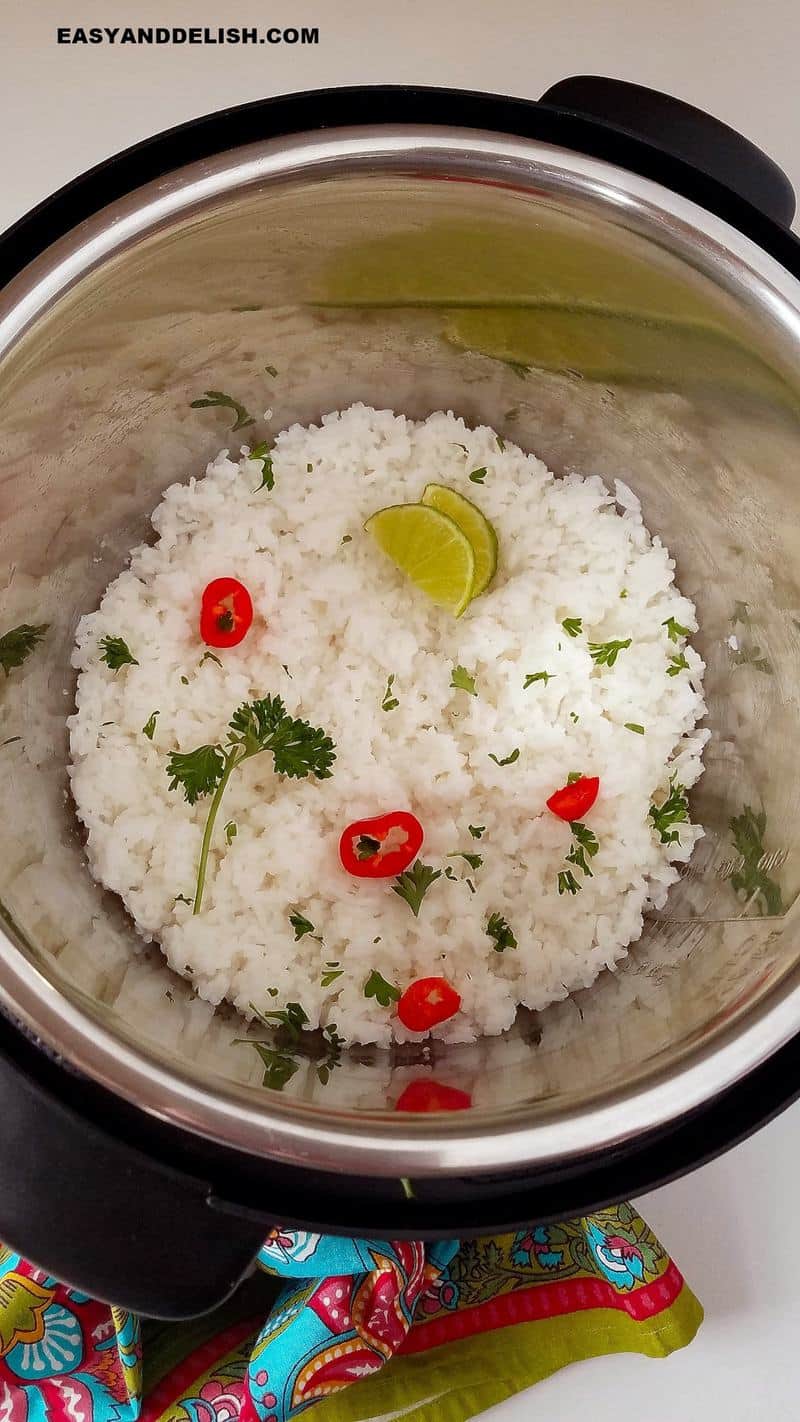 jasmine rice in the Instant Pot with garnishes on top