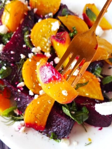 fork with a piece of beet from beet goat cheese salad