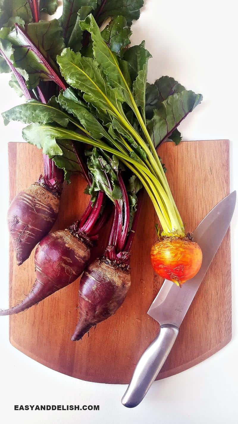 fresh beets on a cutting board