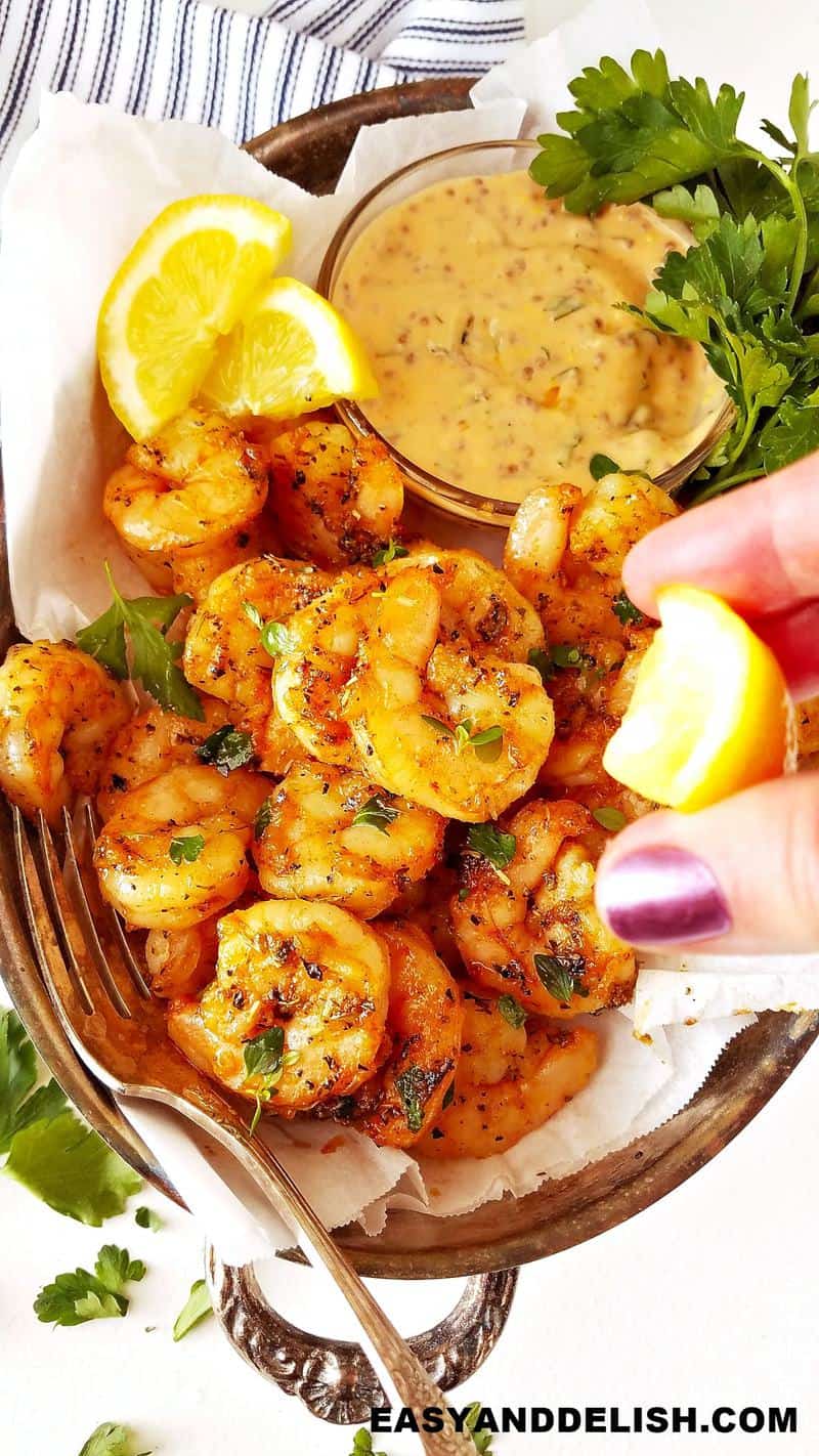 lemon wedge squezed over air fryer shrimp as one of our meals under 300 calories.