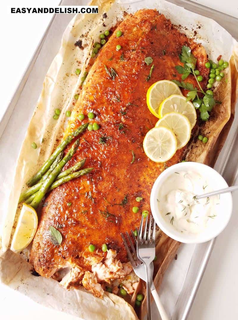 baked salmon on a tray to be served