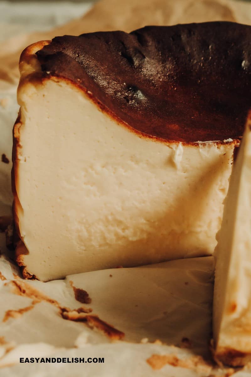 close up of basque cheesecake showing the creamy texture in the center