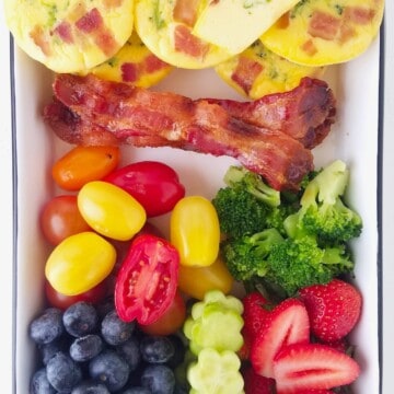 keto egg muffins with bacon, low carb veggies and fruits in a lunch box