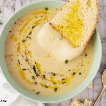 bread dipped in potato leek soup