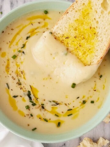 bread dipped in potato leek soup