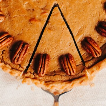 a slice being removed from butterscotch pie