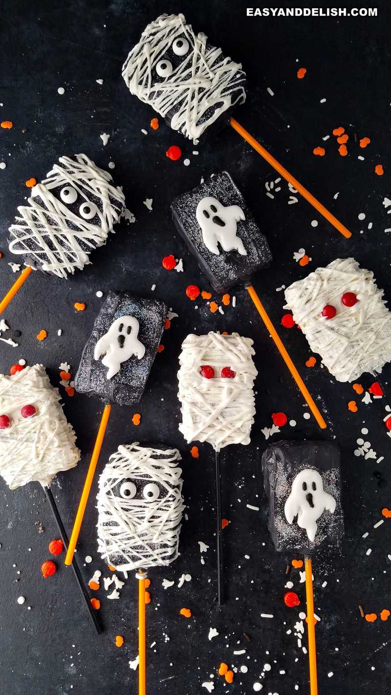 a bunch of halloween rice krispie treats in a glass