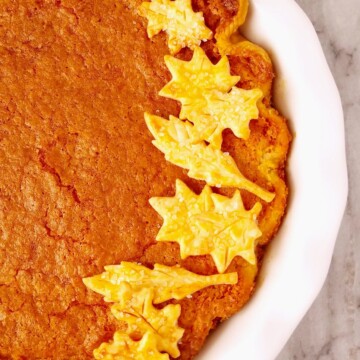 half of a southern buttermilk pie decorated on top