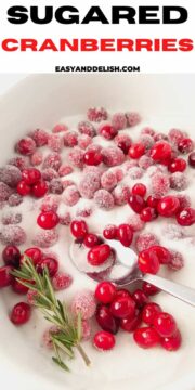 sugared cranberries close up in a bowl of sugar