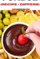 close up of strawberry dipped in chocolate fondue