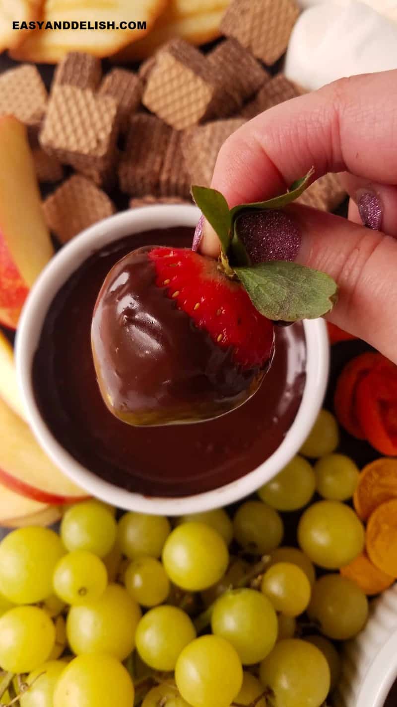 strawberry covered in chocolate fondue