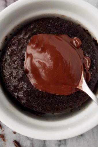 close up of chocolate lava mug cake with a molten center