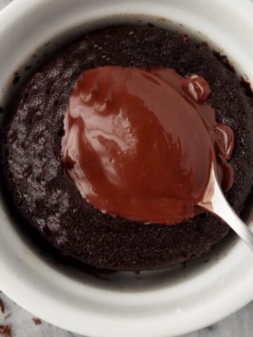 close up of chocolate lava mug cake with a molten center