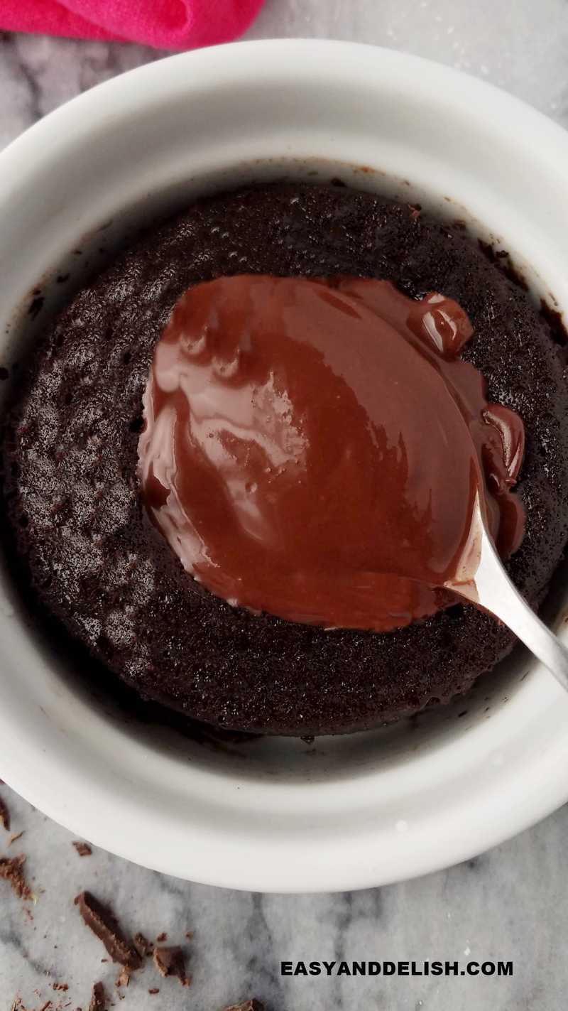 close up of chocolate lava mug cake with a molten center 