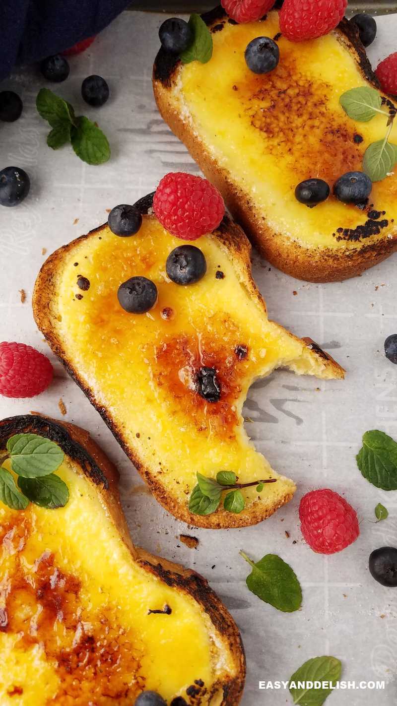 three yogurt toasts in a tray, one was taken a bite