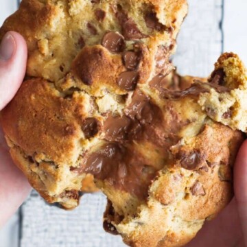 cropped-levain-chocolate-chip-cookies-a-hand-splittinga-cookie-with-gooey-center.jpg