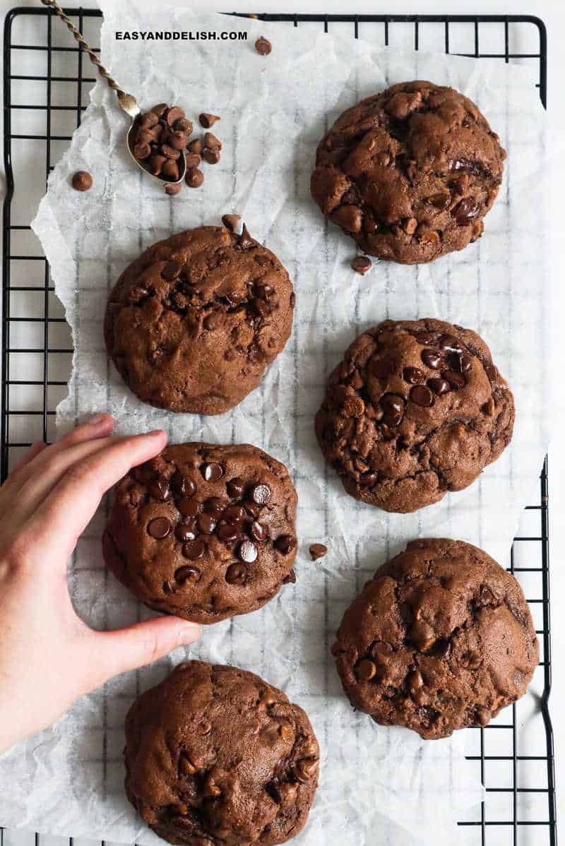 chocolate chocolate chip cookies on a rack