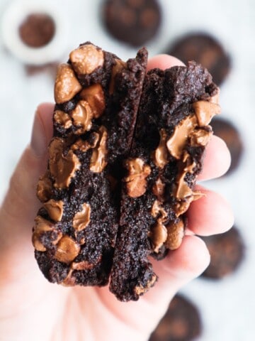 brownie cookies with fudgy centers held in the hand