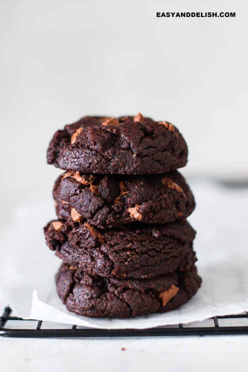 a pile of brownie cookies on a rack