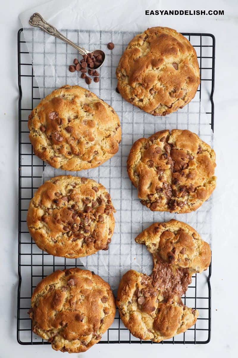 whole and split baked goods cooling on a rack.