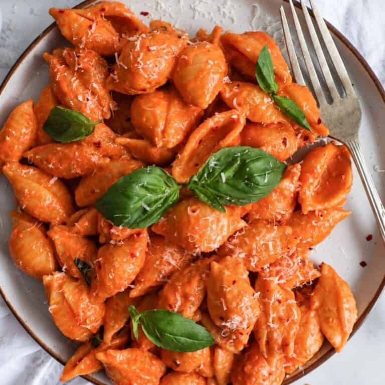 Spicy vodka pasta topped with Parmesan and fresh basil.