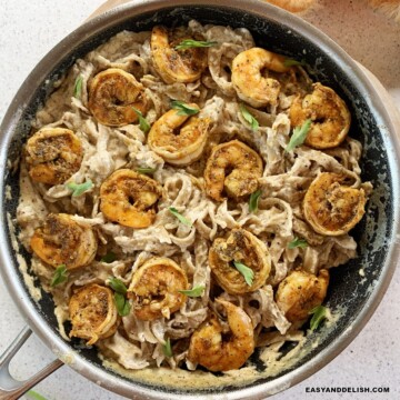 close up of a skillet of creamy cajun shrimp pasta