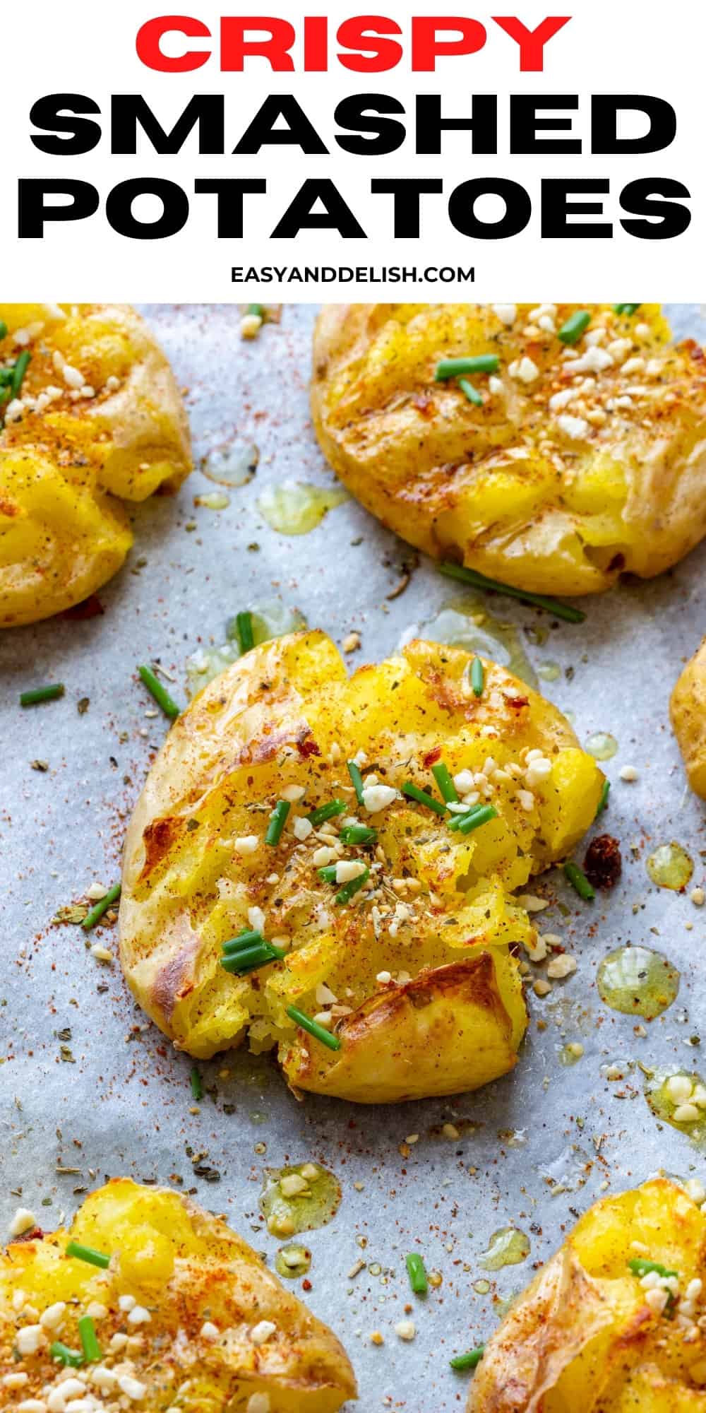 several crispy smashed potatoes in a baking sheet 