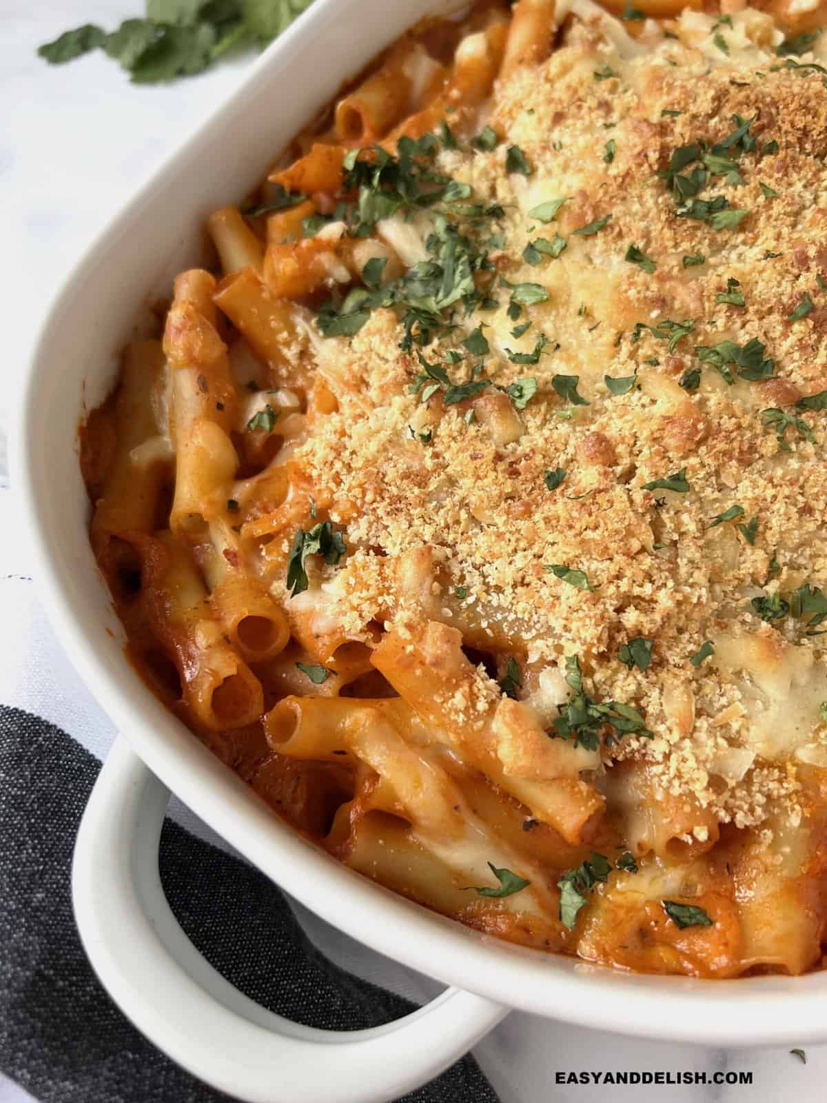 Olive Garden Ziti al Forno topped with crispy bread crumbs and parsley