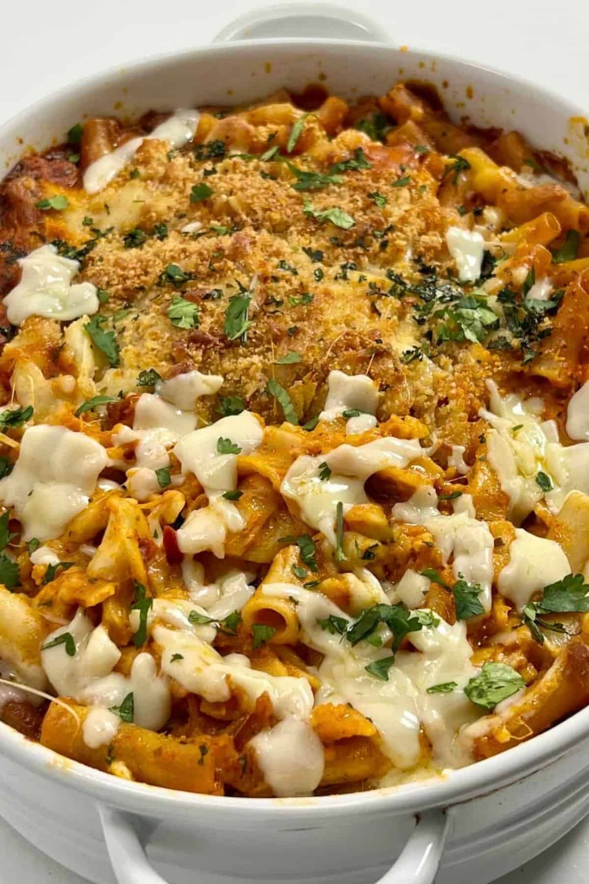 Five Cheese Ziti al Forno topped with melted cheese, golden panko breadcrumbs, and chopped parsley.