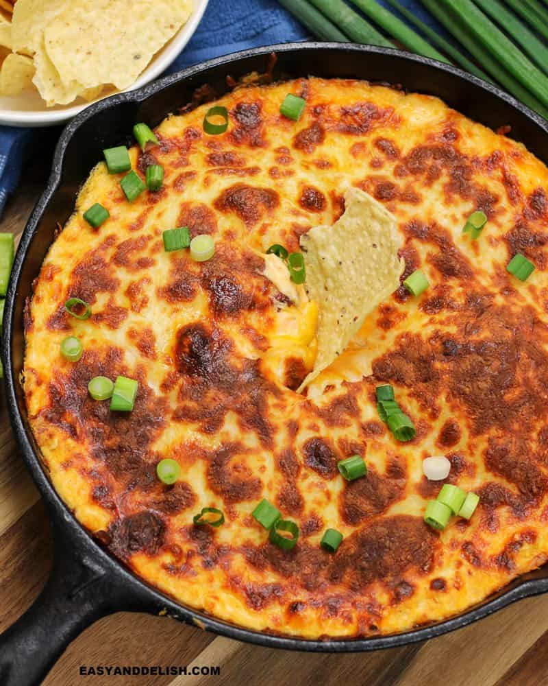 baked and broiled keto buffalo chicken dip in a skillet