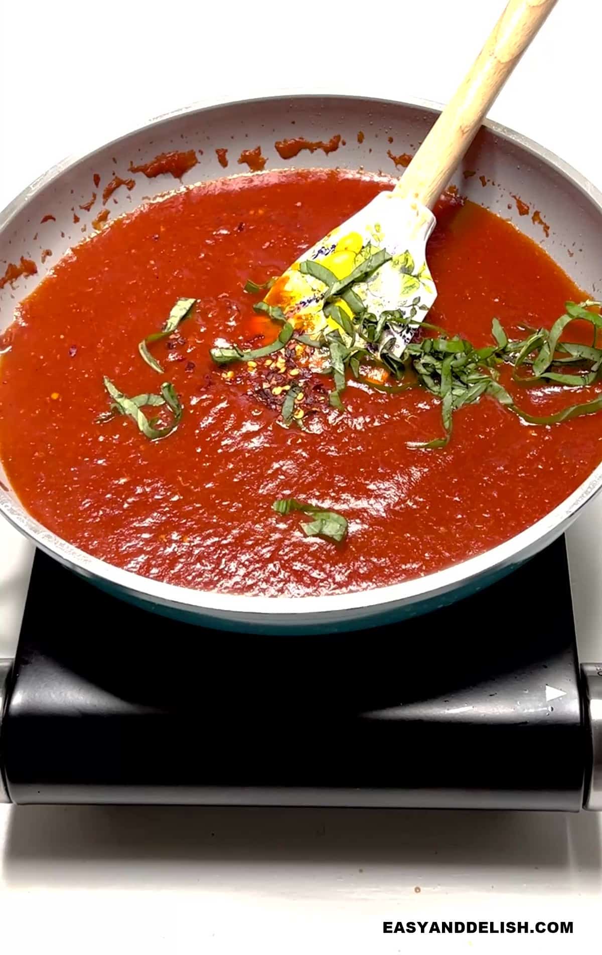 a pan with the liquid cooking on the stovetop