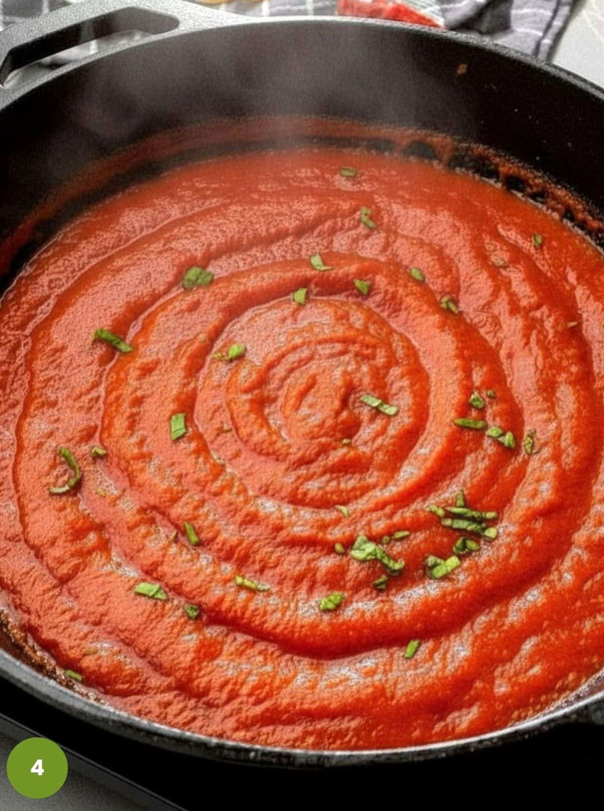 Add basil and adjust seasoning.