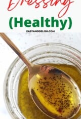 healthy poppy seed dressing in a mason jar and spoon