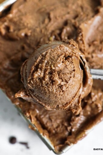 a scoop of high protein ice cream scooped out of a metal container