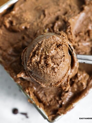 a scoop of high protein ice cream scooped out of a metal container